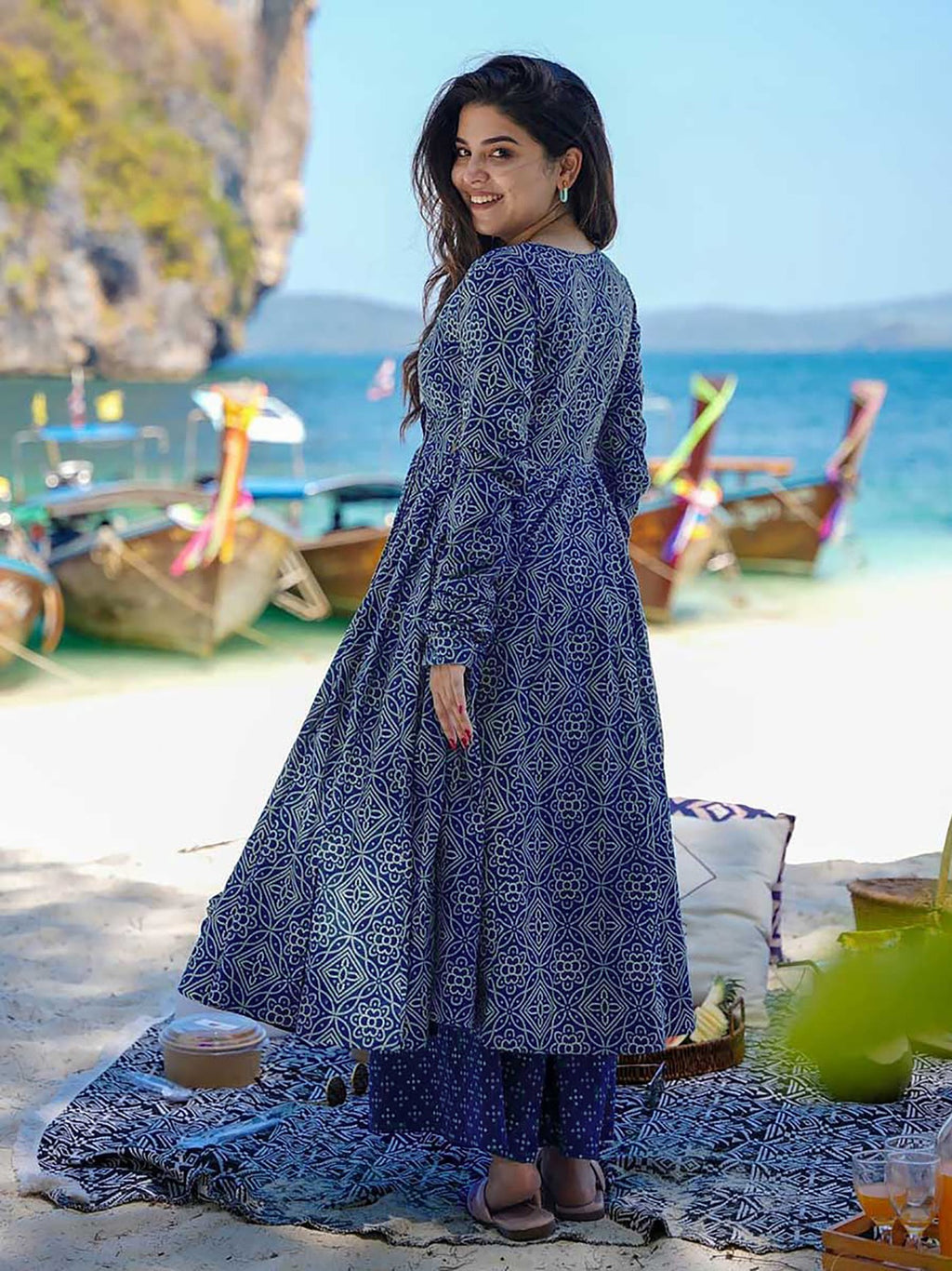 odel in a casual summer indigo blue anarkali with traditional white print, paired with printed palazzo pants and a dupatta, perfect for daytime outings.
