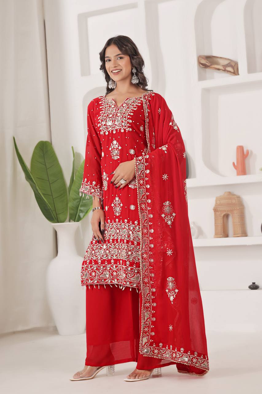 Designer bridal/festive red palazzo suit for women, featuring extensive silver embroidery on the georgette kurta, full sleeves, and matching broad palazzo pants.
