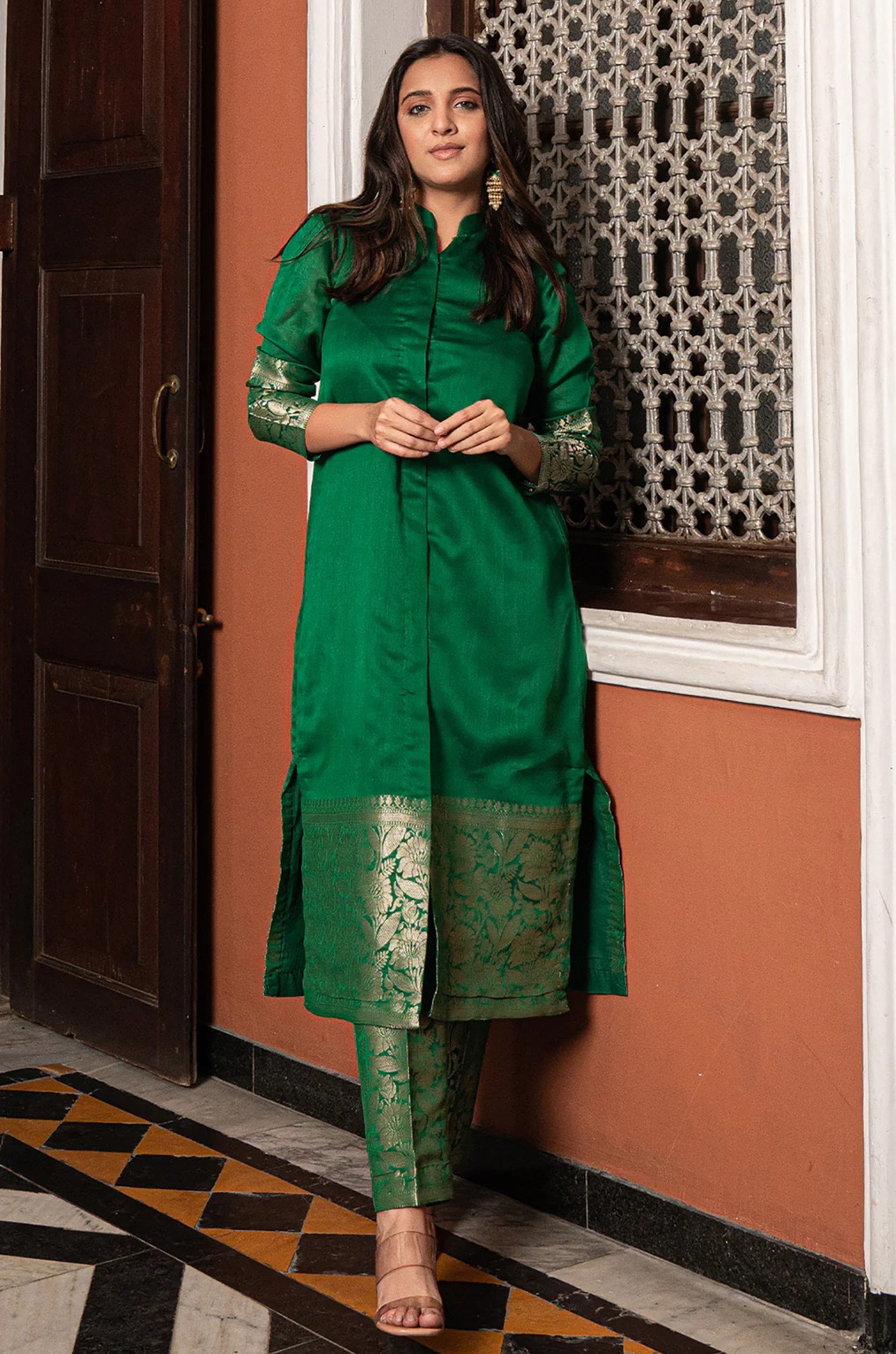 Designer green silk blend kurta set with Banarasi weave detailing and a mandarin collar, perfect for festive wear