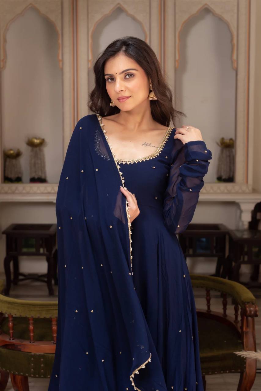 Designer royal blue party wear anarkali dress for women, featuring a full-length georgette gown with subtle gold embellishments and a matching dupatta, ideal for evening events.