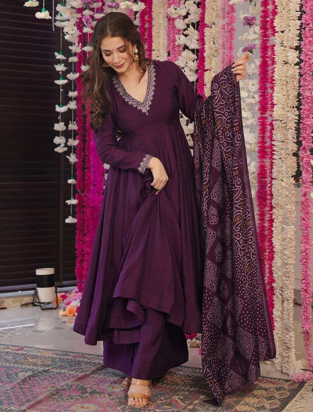 Designer wine georgette anarkali suit for women, featuring a full-sleeve flared kurta and a traditional Bandhej print dupatta, perfect for festive occasions.
