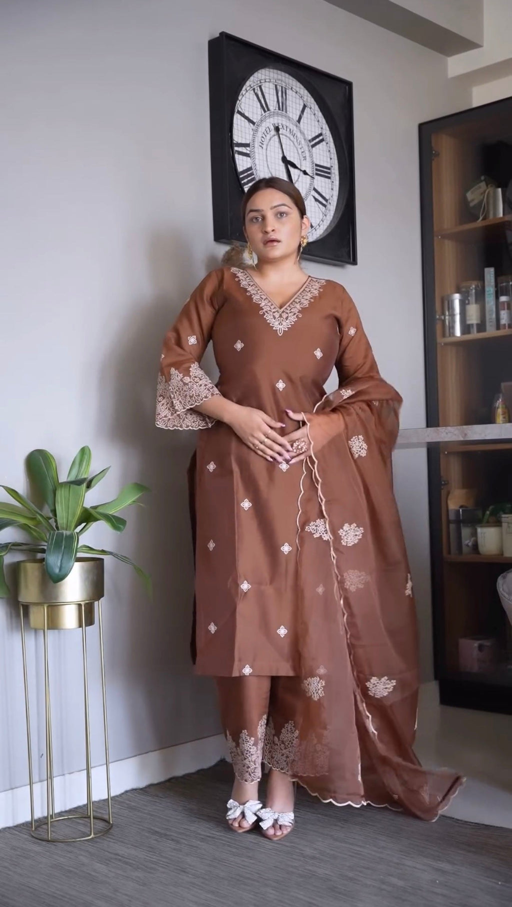 Embroidered V-neck brown kurta set with matching pants and dupatta, showcasing delicate thread work on silk blend fabric.