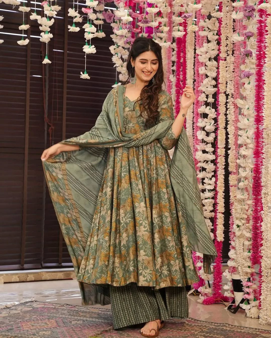 Ethnic floral green kurta palazzo set with a long flared anarkali and coordinating printed dupatta.