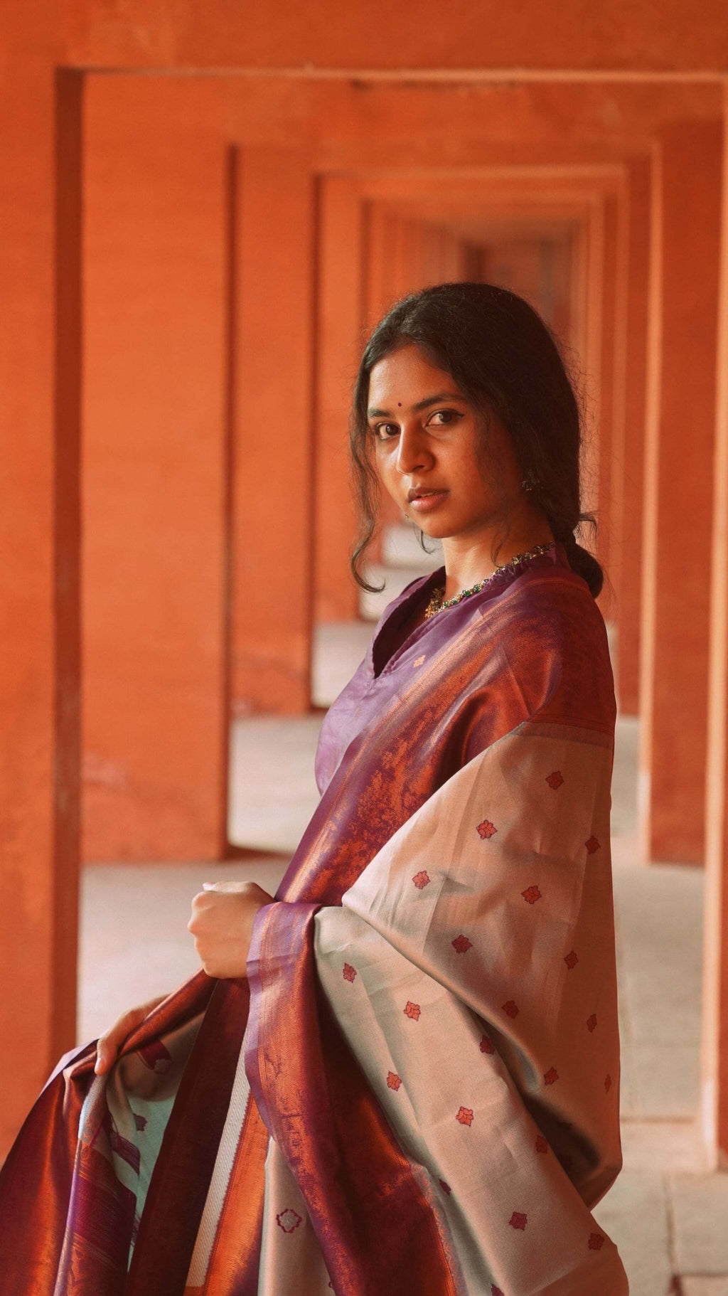 Party wear wine purple silk suit with a luxurious feel, straight pants, and a beautifully woven contrast dupatta.